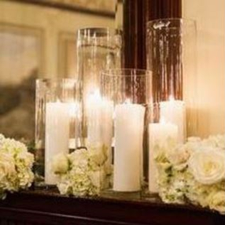 Picture of White candles in vases